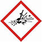 A red square, set on one of its points, outlined on a white background, symbolizing danger. It contains, inside its perimeter, the image of a fragmenting solid black circle projecting debris in all directions. This pictogram is used to warn about the presence of an explosion hazard.